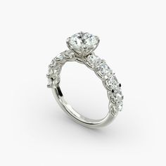 a diamond engagement ring on a white background