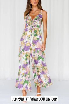 Shop Our Catalog of Women Sets, Rompers & Jumpsuits by Vitaly Couture | Women Outfits | The Floral Print Wide Leg Jumpsuit combines floral charm with contemporary style. Adorned with a vibrant floral print, this jumpsuit radiates a sense of elegance and flair. With its wide-leg silhouette and flattering design, it's a versatile outfit choice that effortlessly transitions from daytime chic to evening glamour, offering a fashionable and comfortable option for various occasions. women fashion sets | skirt and tops | pants and tops | shorts and tops | rompers | rompers for women | denim rompers | chic rompers | classy rompers | jumpsuits for women | classy jumpsuits | date night outfits | date night rompers | date night jumpsuits | fashion for women | chic style | classy style | wpmens outfits Beaded Tie, Chiffon Jumpsuit, Jumpsuit Fitted, Tie Waist Jumpsuit, Print Jumpsuit, Versatile Outfits, Floral Jumpsuit, Print Placement, Printed Jumpsuit