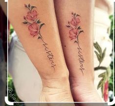 two matching tattoos with the words love and flowers on their arms, one is written in cursive writing