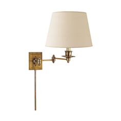 Design Information SKU S 2000HAB-L Parent SKU S2000 Finish Hand-Rubbed Antique Brass Master Finish Natural or Antique Brass Designer Visual Comfort Category Wall Lights Function Functional Style Traditional Color Gold UPC 756808149327 Relatives Swing Arm Sconce Dimensions & Weight Size 17.5 Height (Inches) 13" Width (Inches) 17.5" Extension 18.5" Backplate 3.5" x 4.5" Rectangle Fixture Weight (lbs) 8 Bulb & Electrical Information Socket E26 Dimmer Wattage 100 A19 Bulb Shape A Certi Note DRY Cert Shade Wall, Cord Cover, Lighting Showroom, Wall Light Fixtures, Linen Shades, American Design, Modern Colors, Visual Comfort, New Furniture