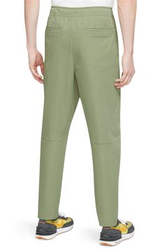 Sporty and comfortable, these lightweight pants topped with a drawstring waist feature handy pockets and a fit that tapers to stay close and out of your way. 100% polyester Machine wash, dry flat Imported Moisture-wicking Stretch Joggers With Tapered Leg, Sporty 4-way Stretch Pants With Side Pockets, 4-way Stretch Sports Joggers With Tapered Leg, Nylon Joggers With 4-way Stretch, Nylon Joggers With 4-way Stretch And Pockets, Lightweight Pants, Drawstring Waist, Leg Pants, Nordstrom