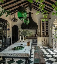 the kitchen is decorated in black and white checkered flooring, with green accents