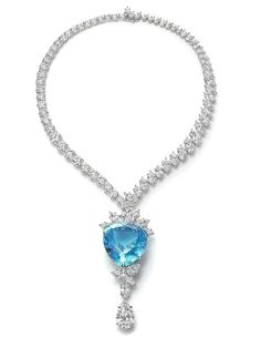 Handmade Necklace Recycling: No Silver weight: 56.900 Grams Necklace Length: 18.00 Inches Gemstone: Moissanite Diamond & Blue Topaz Diamond weight: 18.22 ct Diamond shape: Round, Marquise & Pear Diamond : Lab created Blue Topaz weight: 48.08 ct Blue Topaz: Lab created Material: Silver Silver Purity: 925 Stone putting: prongs Necklace Finished: White Blue Heart Cut Necklace For Formal Occasions, Fine Jewelry Sapphire Heart Cut Necklace, Hallmarked Sapphire Necklace For Wedding, Wedding Necklace With Diamond Accents And Blue Topaz, Wedding Necklace With Blue Topaz And Diamond Accents, Wedding Sapphire Necklace Hallmarked, Wedding Blue Topaz Necklace With Diamond Accents, Silver Sapphire Necklace With Heart Cut, Heart Cut Sapphire Gemstone Necklace