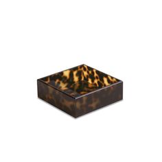 a brown and black square box with an animal print pattern on the inside, sitting on a white surface