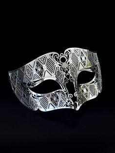 Our laser-cut metal mask boasts a stunning silver finish that shines and shimmers, ensuring you stand out in any crowd. Crafted with your comfort in mind, our mask is lightweight and easy to wear for hours on end.


Age Group/Gender - Adult/Men

Size/Type - One size fits all adults

Mask Color - Silver

Mask Material - Laser cut metal Silver Full Face Mask For Masquerade, Elegant Silver Masks As Gift, Silver Full Face Masquerade Mask, Elegant Silver Eye Mask, Full Face Silver Masquerade Mask, Silver Eye Mask For Masquerade, Silver Party Mask, Silver Eye Mask For Carnival, Silver Eye Mask For Carnival Masquerade