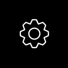 a black and white image of a cogwheel