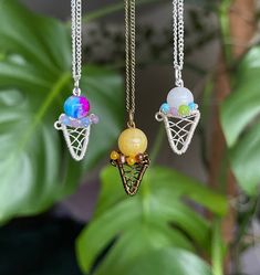 "🍦 Ice Cream Cone Necklaces🍦 * Made to order! You pick the stone and sprinkles of your choice and colored wire (silver or bronze, type in this info at checkout. If you don't, I'll pick out the colors that will look best with the stone you have chosen. * Come with a 16\" chain * Each cone measures roughly 1\" tall 🌿Follow me on Instagram & TikTok @crystal.lune" Beaded Metal Charm Necklaces For Gifts, Nickel-free Multicolor Crystal Necklaces, Multicolor Nickel-free Crystal Necklaces For Jewelry Making, Wire Wrapped Metal Beaded Necklaces For Gifts, Wire Wrapped Metal Beaded Necklaces As Gifts, Wire Wrapped Metal Beaded Necklace Gift, Wire Wrapped Metal Beaded Necklace For Gift, Gift Crystal Necklace With Beaded Sterling Silver Chain, Gift Crystal Necklace With Beaded Chain In Sterling Silver