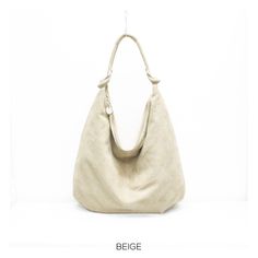 A perfect bag for shopping and carrying daily essentials Genuine Made in Italy suede oversized hobo shoulder bag Dimensions: W 44cm x H 34cm x  variable depth Outer Material: Genuine Suede/Genuine Leather Material Composition: Genuine Suede The bag is fully lined inside. with 1 zipped pocket and 1 phone pocket Top zipped and silver hardware Fast delivery! Everyday Beige Hobo Bag With Leather Handles, Soft Leather Beige Shoulder Bag For Everyday, Soft Leather Beige Shoulder Bag For Daily Use, Everyday Beige Soft Leather Shoulder Bag, Soft Leather Pouch Hobo Bag For Everyday, Beige Soft Leather Hobo Bag For Daily Use, Soft Leather Hobo Bag In Pouch Shape For Everyday, Everyday Soft Leather Pouch Hobo Bag, Versatile Beige Soft Leather Hobo Bag