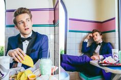 a man in a tuxedo sitting at a table