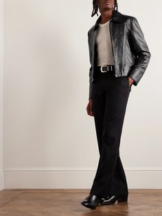 No fashion designer has such a strong relationship with rock stars as CELINE HOMME's Hedi Slimane – bands have even written music for his shows. Reflecting the scene, this jacket is cut from black leather and panelled to create a tapered, slightly cropped profile. Wear yours with distressed jeans and tailored trousers alike. Small to size. See Size & Fit notes. Fitted Biker Leather Jacket For Formal Occasions, Fitted Biker Jacket For Evening In Fall, Fitted Biker Jacket For Fall Evenings, Fitted Leather Biker Jacket For Formal Occasions, Winter Leather Jacket For Concerts, Edgy Fitted Leather Jacket For Concerts, Fitted Black Biker Jacket For Evening, Elegant Leather Biker Jacket For Night Out, Fitted Biker Jacket For Fall Concerts