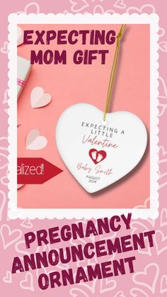 a heart shaped ornament with the words expecting mom gift