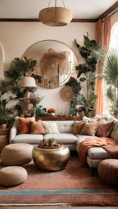 a living room filled with lots of furniture and plants on top of a rug in front of a mirror