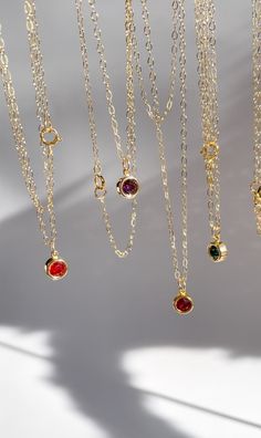 Introducing our exquisite Rebirth Collection - a timeless celebration of elegance and individuality. Our first piece is our Birthstone Necklace, featuring a solitaire birthstone pendant delicately suspended from a graceful chain. Each necklace is 16 inches, however we can make them longer if you need, just leave us a message with the necklace length you want when checking out. January: Garnet February: Amethyst March: Aquamarine April: Diamond May: Emerald June: Alexandrite July: Ruby August: Peridot September: Sapphire October: Opal November: Topaz December: Tanzanite PLEASE MAKE SURE TO WRITE WHICH BIRTHSTONE(S) YOU CHOOSE UNDER THE PERSONALIZATION BOX!! Formal Round Birthstone Necklace With Delicate Chain, Classic Gold Birthstone Necklace With Round Stone, Gold May Birthstone Necklace With Round Stone, Elegant Birthstone Necklace With Round Pendant On Cable Chain, Gold Necklace With Round May Birthstone, Gold Necklace With May Birthstone, Delicate Solitaire Necklace With Cable Chain, Elegant Emerald Birthstone Necklace In Bezel Setting, Delicate Solitaire Necklace With Cable Chain As Gift