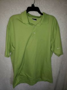 Nike Men's Button Up Shirt Size L (4S). Condition is Pre-owned. Shipped with USPS First Class. His a spot on the back Nike Casual Collared Shirt, Casual Nike Collared Shirt, Nike Classic Collared Tops, Classic Collared Nike Tops, Classic Nike Collared Tops, Nike Cotton Collared Tops, Green Cotton Golf Shirt, Casual Nike Cotton Polo Shirt, Nike Cotton Short Sleeve Polo Shirt