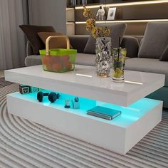 a white coffee table with blue lights underneath it