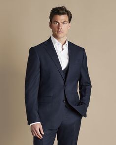 Super 120's woolmark certified pure merino wool, Natural stretch and crease recovery, Available in classic and slim fit, Body Lining: Exclusive Charles Tyrwhitt Lapwing 52% polyester, 48% viscose lining in navy, AMF stitching along notch lapel and flap pockets for a timeless finish, Half-canvas construction, Straight flap pockets, chest pocket and internal jet pockets - Ultimate Performance End-on-End Suit Jacket - Navy | Men's Charles Tyrwhitt Ultimate Performance End-On-End Suit Jacket - Navy Wedding Party Outfits, Charles Tyrwhitt, Navy Man, Photography Poses For Men, Business Shirts, Party Outfits, Fit Body, Poses For Men, Flap Pocket