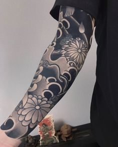 a person with a tattoo on their arm