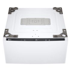 a white chest freezer sitting on top of a table