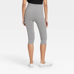 Keep your casual style on point with these High-Waist Cotton Blend Seamless Capri Leggings from A New Day™. These below-knee ankle leggings make a go-to pick whether you're hanging around the house or heading out casually. They feature a high-rise fit to create a flattering silhouette, along with a cotton gusset for breathable wear. Plus, the seamless leggings are crafted from soft, stretchy fabric for comfortable movement. Pair them with a range of tank tops, tees and sweatshirts, along with sn Casual Solid Color Biker Shorts, Seamless Casual Loungewear Leggings, Spring Seamless Biker Shorts, Casual Tight Hip-length Activewear, Basic Seamless Spring Bottoms, Basic Seamless Bottoms For Spring, Casual Gray Tight Activewear, Casual High Stretch Capris For Yoga, Casual Stretch Activewear Knee-length Shorts