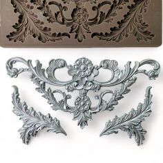 decorative molds are displayed on a white background, including an ornate design with leaves and flowers