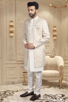 Introducing our U2-S345 sherwani, a sophisticated and exclusive piece for the modern man. This open jacket sherwani exudes elegance with a touch of luxury, perfect for any formal occasion. Elevate your style with our finely-crafted sherwani, designed to make a statement with its timeless design and impeccable fit. Groom Brother Outfit Indian Men Wedding, Sherwani For Dark Skin Groom, Jacket Sherwani For Men, Elegant Semi-formal Sherwani, Classic Sherwani For Groom In Festive Season, Formal Off White Nehru Jacket With Dabka, White Zari Work Suit For Formal Occasions, Classic Festive Sherwani For Groom, Shervani Design For Men Simple