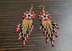 These beautiful Huichol Hand Beaded Fringe Earrings are sure to please. Perfect for that boho style or hippie jewelry. These earrings are for display only. Your earrings will be made to order in the colors of your choice. It usually takes 2-4 days to complete a pair of earrings, but Christmas rush may extend that time by a day or two. ❤ SIZE & DETAILS ♡ Hooks are 22k gold plated fish hook wire. (Hooks can be swapped between silvertone metal fish hook wires, silvertone clip-on or 22k gold plated Adjustable Gold Beaded Earrings For Festival, Adjustable Round Beaded Earrings For Festive Occasions, Traditional Gold Beaded Earrings As Gift, Unique Beaded Earrings With Tiny Beads For Festivals, Traditional Dangle Jewelry With Bead Caps, Artisan Gold Beaded Festival Earrings, Artisan Gold Beaded Earrings For Festivals, Festival Earrings With Gold Beads, Artisan Gold Beads Earrings For Festival