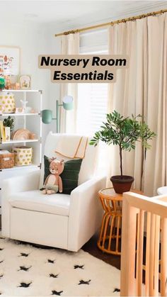 a baby's room with white furniture and accessories on the shelves, including a teddy bear