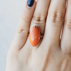 An irresistible deep salmon hue, this cabochon cut Victorian coral ring is calling to you. Made from 18k yellow gold, the filigreed basket holds the coral in place with fun double claw prongs. Currently the ring is a size 5, but can be adjusted to a number of sizes for a small fee. Baraka Gems is committed to sustainable jewelry practices. We purchase & sell strictly antique & vintage coral. Baraka Gems does not support new coral harvests. Estate Wedding Ring, Estate Rings, Ring Shank, Gem Diamonds, Claw Prong, Coral Ring, Contemporary Ring, The Coral, Sky Art