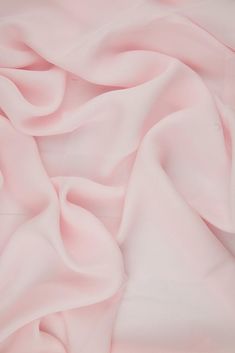 Baby Pink Silk Double Georgette Fabric is a remarkably durable, lightweight premium silk that offers an extremely graceful drape and a soft, dull finish. This fabric is ideal for blouses, gowns, dresses, and overlays. The fabric's soft, airy appearance also makes it suitable for scarves and other accessories. The fabric is sold by the Yard, and measures 44 inches in width. Baby Pink Silk, Draping Fabric, Spring Event, Dupioni Silk, Pinky Promise, Georgette Fabric, Silk Wool, Pink Blouse, Pink Silk