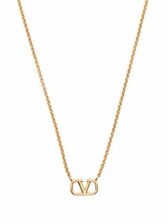 Shop Valentino Garavani VLogo Signature pendant necklace with Express Delivery - FARFETCH Gold-tone Plated Jewelry With Logo Plaque, Formal Gold-tone Necklace With Logo Plaque, Luxury Gold Chain Necklace With Logo, Luxury Gold Chain Necklace With Logo Plaque, Formal Gold Necklace With Gold-tone Logo Plaque, Gold-tone Logo Plaque Pendant Necklace As Gift, Gold-tone Logo Plaque Pendant Necklace, Gold-tone Pendant Necklace As A Gift, Gift Necklace With Gold-tone Logo Pendant