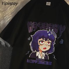 a black t - shirt with an anime character on it