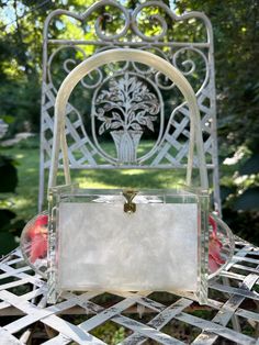 "Thank You If You Favored One of My Items! You Will Receive 10% Off an Item of Your Choice, Unless It Is On Sale, Code17. Thank You. RARE LUCITE Handbags/Lucite Bags/50's Lucite Handbags/Unique Lucite Purses/50's Handbag/Vintage Lucite PursesNear MINT Condition Circa 1950's RARE Lucite Handbag These Coffin Lucite Handbags are very Rare.  Sometimes they are called Wedding Handbags.  This one is particularly Rare because Flowers are on the Ends rather than the Top.  Most often you see them done in Evening Bucket Box Bag With Handles, Bucket Box Bag With Handles For Evening, Vintage Rectangular Party Bag, Vintage White Bag With Pearl Handle, Vintage White Bags With Pearl Handle, Vintage Shoulder Bag With Pearl Handle For Everyday, Vintage Rectangular Box Bag For Party, Vintage Square Box Bag, Vintage White Rectangular Bag