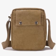 This Stylish Men's Canvas Messenger Bag is a crossbody casual bag that can be handy and has multiple functions. It can serve as a mini travel bag, a tool bag, or an everyday work or school bag. This simple but stylish bag has room for a tablet, books, mobile phones, car keys, credit cards and many other everyday essentials. This bag will also make a great gift for any hardworking man you know! Features: Long adjustable shoulder strap Multiple sized pockets available Measures 20cm x 23cm x 9cm Bu Casual Crossbody Satchel For Everyday Carry, Everyday Shoulder Bag With Pockets, Casual Rectangular Everyday Carry Bags, Casual Everyday Carry Rectangular Bag, Casual Portable Shoulder Bag For Everyday Carry, Casual Everyday Carry Bags With Cell Phone Pocket, Multifunctional Everyday Bags With Pockets, Multifunctional Shoulder Bag With Cell Phone Pocket For Everyday, Casual Shoulder Bag With Adjustable Strap For Everyday