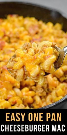 a spoon full of macaroni and cheese being lifted from a skillet with the words, easy one pan cheeseburger mac