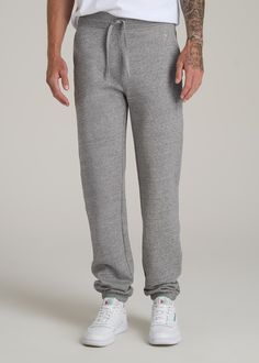 The Ultimate Fleece Sweatpants for Tall Men Relax, You’re Covered Introducing the Wearever 2.0 Fleece Sweatpants—because tall guys deserve the best chill pants too! These aren’t just any tall men's sweatpants; they’re your new go-to for everything from Netflix marathons to casual Fridays. With a new and improved waistband and stylish woven drawcords, you get the comfort you crave with the style you need. Plus, the soft fleece of these men's extra-long sweatpants keeps you warm while the stretch Sweatpants Outfit Men, Straight Leg Sweatpants Outfit, Long Sweatpants, Straight Leg Sweatpants, Scrubs Dress, Cozy Sleepwear, Casual Fridays, Sweatpants Outfit, Tall Men