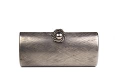 Vintage clutch RODO, Firenze, in brushed aged silver metal, with a lovely clasp closure with metal cord. The interior is lined in synthetic silver leather, with a small pocket. Excellent condition, slight signs of use, with two small scratches and a tiny dent on one side, see last three images. Dimensions: Height: 8.50 cm. | Width: 18.00 cm. | Depth: 4,5.00 cm. | Condition: EXCELLENT More vintage items in my online shop: http://www.vintagecarwen.com Silver Rectangular Metal Clutch, Silver Metal Clutch As Gift, Elegant Metallic Clutch For Formal Occasions, Formal Silver Metal Evening Bag, Chic Silver Clutch With Silver-tone Hardware, Vintage Silver Clutch For Events, Silver Clutch With Silver-tone Hardware For Events, Formal Silver Clutch With Magnetic Closure, Silver Clutch With Magnetic Closure