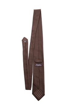 Embrace classic elegance with this dark chocolate brown grenadine tie that will give your look understated sophistication and will make a lasting impression. Extra Long Length: Approx. 3.38" x 62.5". A classic tie width and length that is perfect for most men taller than 6'2". 100% silk grenadine garza fina: Garza fina (fine gauze) is a loose weave fabric made from high-twist yarns. It has a slightly knobby texture. Tipped with our signature pinstripe silk: Not only is it a refined finishing tou Dapper Brown Tie For Business, Classic Brown Fitted Suit And Tie Accessories, Brown Semi-formal Standard Tie, Brown Standard Tie For Business, Elegant Tailored Brown Suit And Tie Accessories, Classic Tailored Brown Suit And Tie Accessories, Brown Standard Tie, Elegant Brown Tie For Semi-formal Events, Dapper Brown Suit And Tie Accessories For Semi-formal Occasions