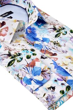 The Treffort Men's Henshaw MULTICOLOR PRINT long sleeve button down dress shirt is ideal for special occasions, weddings, and business meetings. Made from 100% premium luxury cotton with meticulous craftsmanship, the Henshaw shirt is a photo-realistic floral piece that brightens any outfit. Materials 100% premium luxury cotton Durable resin buttons Design/Fit Contemporary fit Signature neck piping Mitered cuff with contrast fabric Spread collar with removable collar stays 18 stitches per inch Li Designer Formal Shirt With Floral Print, Elegant Shirt With Floral Print And Spread Collar, White Floral Print Shirt For Formal Occasions, Luxury Long Sleeve Dress Shirt For Wedding, Elegant White Shirt With Floral Print, Long Sleeve Button Down Dress, Buttons Design, Resin Buttons, Removable Collar