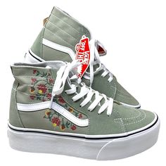 Vans Sk8-Hi Tapered Shoes Platform Women Floral Desert Suede Canvas Vn0a7q5pudp Brand New With Box. 100% Authentic! From Vans Comes The Sk8-Hi Tapered Stackform Shoes In A Floral Embroidery Colorway, With Beige Uppers Boasting Red And Yellow Embroidered Flowers Along The Quarters. The Platform Silhouette Boasts A Lifted Midsole, While A Slender Ankle And White Leather Side Stripes Complete The Redesigned Look. Sk8-Hi Tapered Stackform Floral Embroidery Platform Shoes From Vans. Suede And Canvas Platform Vans, Vans Suede, Floral Graphics, Stunning Shoes, Vans Sk8 Hi, Shoes Platform, Shoe Inspiration, Sk8 Hi, Trendy Sneakers