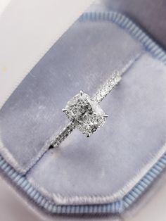 an engagement ring in a velvet box