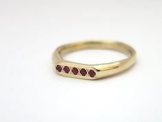 A beautiful 14k solid yellow, white or rose gold signet ring for women with 5 red rubies.A dainty 14K yellow solid gold signet ring with 5 rubies. At the front of the ring, there are delicate circular engravings that ad grace to this very feminine ring. This beautiful ring is light and comfortable to wear and will be great for everyday use, as for special occasions. You can wear it on its own as a singular ring but it will also look extra-chic stacked with other rings. This can also be a great c Gold Bar Ring, Signet Rings Women, Ruby Wedding Rings, Unique Gold Rings, Gold Jewelry Gift, Chic Rings, Bar Ring, Dainty Gold Rings