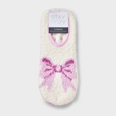 Keep your feet warm and cozy with the Women's Bow 2pk Cozy Liner Socks - Ivory/Pink 4-10. Made from lightweight knit fabric, these liner-height socks are perfect for slipping into your favorite socks . Crafted with smooth toe seams and nonslip grippers and a cute bow design that adds a fun touch to any outfit while enjoying comfort and style for everyday wear. Soft Comfortable Indoor Socks, Comfortable Cream Socks For Winter, Super Soft White Socks For Loungewear, Cream Socks For Winter, Comfortable White Socks For Loungewear, Comfy White Socks For Loungewear, Comfortable Super Soft Cream Socks, Comfortable White Indoor Socks, White Super Soft Socks For Loungewear