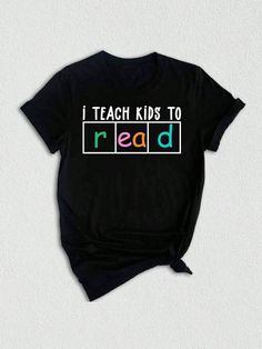 a black t - shirt with the words i teach kids to read printed on it