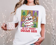 Celebrate the holiday season with this fun 'In My Merry Doula Era' t-shirt! Perfect for doulas who support families through childbirth, this festive design adds a joyful touch to their work or casual wardrobe. Made from soft, high-quality fabric, it's a thoughtful and unique Christmas gift for the doula who helps bring new life into the world with care and compassion. The unisex soft-style t-shirt puts a new spin on casual comfort. The shoulders have twill tape for improved durability. There are no side seams. The collar is made with ribbed knitting to prevent curling damage.  .: Made with lightweight fabric this unisex t-shirt feels like a bliss to wear all year round.  .: The classic fit with the crew neckline delivers a clean, versatile style that can match any occasion.  .: All shirts Picu Nurse, Oncology Nursing, Nurse Appreciation Gifts, Nurse Christmas, Tree Cakes, Nurse Appreciation, Emergency Room, Nursing Tshirts, Appreciation Gifts