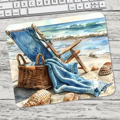 a computer mouse pad with a beach scene on it