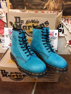 This is a beautiful coloured pair of original, Made in England Dr Martens boots.  These were produced in the 1990s. The leather used is the best quality.  They are a Blue Canyon leather that's hardly and comfortable.  You wipe clean the upper with a slight damp cloth. They have trademark cushioned sole unit and yellow stitching.  We have size 6/39 and 6.5/40 available Blue Leather Boots For Streetwear, Vintage Blue Leather Boots, Colin Baker, Martens Boots, Dr Martens Boots, The 1990s, Dr. Martens Boots, Dr. Martens, Boot Shoes Women