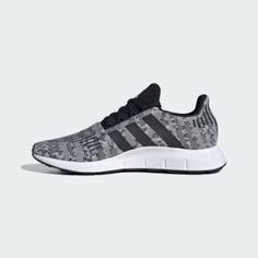 Stay on your toes with the new Swift Run 1.0 Athletic Shoe from adidas! You'll be light on your feet with the retro-inspired style of the Swift Run 1.0 Athletic Shoe, featuring a breathable knit upper with signature side stripes, and lightweight EVA midsole for exceptional impact resistance and support.