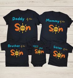 Celebrate your family's bond with our matching family shirts, perfect for any occasion! Personalize these "Mommy of the Son" and "Daddy of the Son" tees to create a unique and special set that showcases your love and pride. Whether you're planning a family trip, a memorable photo shoot, or simply want to show off your family unity, these shirts make a thoughtful and heartwarming gift for new moms, dads, and growing families. Perfect for travel, pregnancy announcements, or just a day out with your little one, these matching tees are a must-have for any family. Order yours today and create lasting memories with your personalized family shirts! Note: Product measurements may vary by up to 2 inches (5 cm). Please measure before purchasing. These garments feature unisex sizing, offering a comfo Family Matching Short Sleeve Tops For Family Events, Black Tops With Graphic Print For Family Events, Black Cotton T-shirt For Family Outings, Black Cotton Tops For Family Events, Custom Print Black Top For Family Gatherings, Black Custom Print Top For Family Gatherings, Black Tops With Custom Print For Family Gatherings, Matching Letter Print Tops For Family Events, Customizable Fun Tops For Family