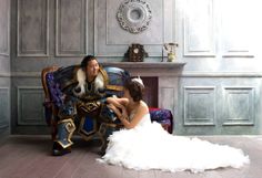 a woman in a wedding dress sitting on a chair next to a man