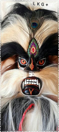 🌸FREE SHIPPING🌸 The Bujang Ganong mask is one of the complementary masks for the traditional art of Reog Ponorogo, Bujang Ganong is the Patih of Prabu Kelono Sewandono who created the Reog art. material: - wooden mask - Sintetic hair - peacock feather decoration on the forehead mask this mask beautiful as wall decor in your house, office, hotel or cafe...also perfect to use at halloween party 😍 for souvenir, gifts, etc. 🌺 Thank You 🌺 Traditional Full Face Carnival Masks, Traditional Masks And Prosthetics For Carnival, Traditional Festival Masks And Prosthetics, Handmade Traditional Mask, Traditional Masks For Masquerade And Festivals, Traditional Masks And Prosthetics For Masquerade Festivals, Traditional Black Masks And Prosthetics For Carnival, Traditional Carnival Masks And Prosthetics, Feather Decor